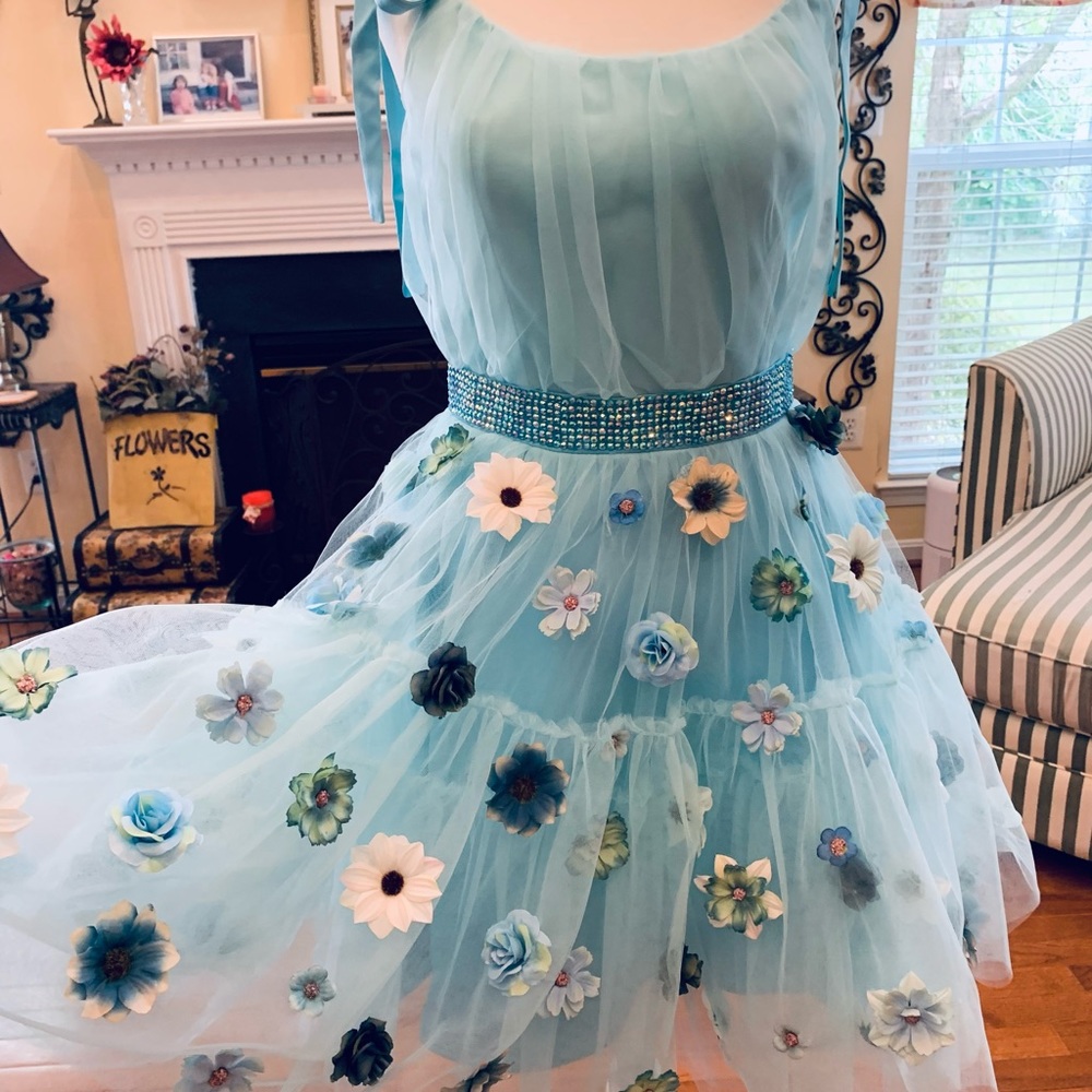 “Whimsical You”! Blue multi floral tulle cocktail with shoulder ties. Unique!